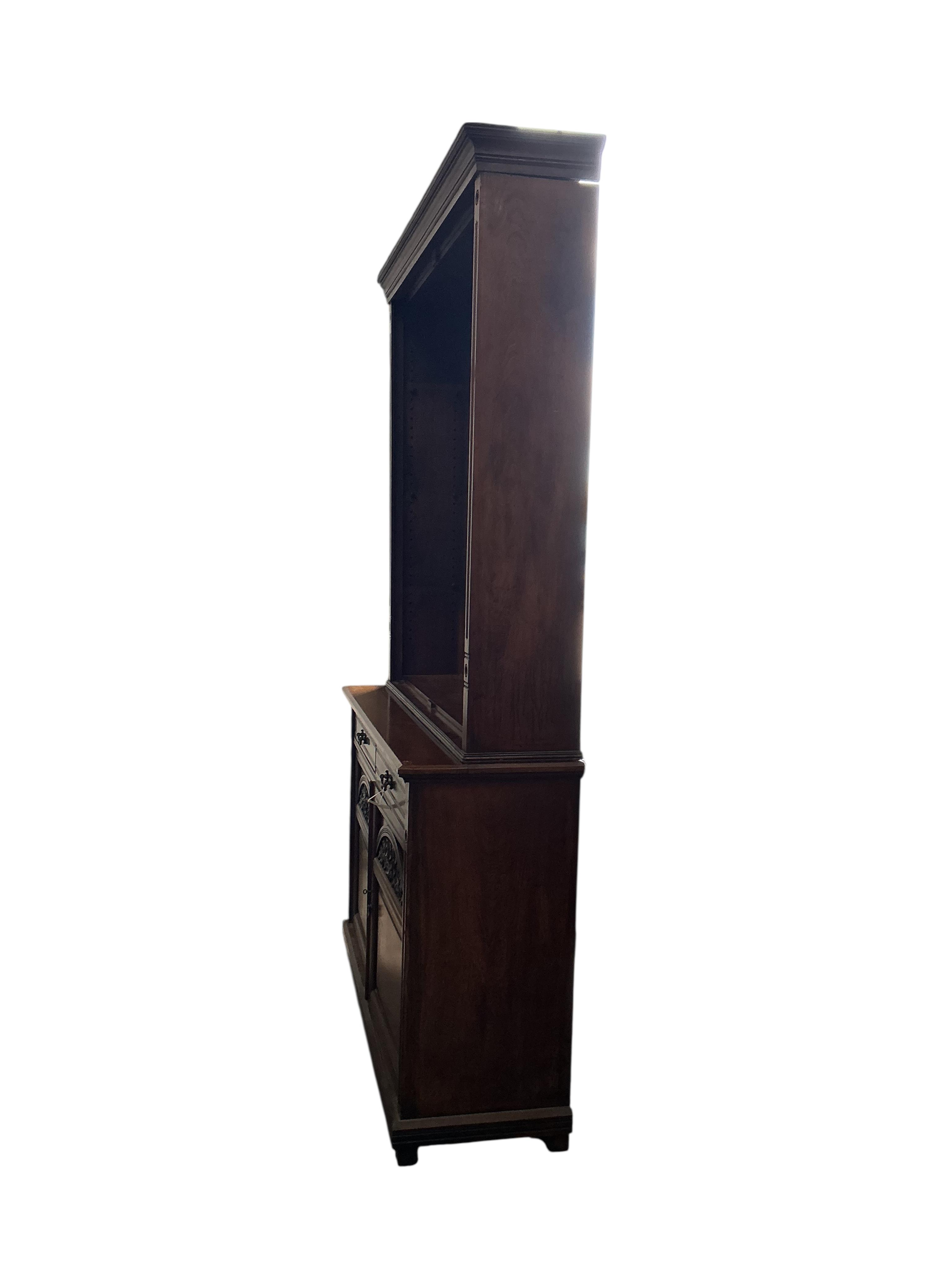 A late Victorian oak library bookcase, lacking doors, width 138cm, depth 44cm, height 230cm